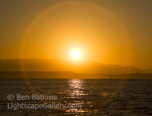 Sunset on Puget Sound. Seattle, Washington. Sailors enjoy the setting summer sun in Seattle.  Ben Babusis, Lightscape Gallery.