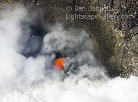 Fire Meets Water. Kalapana, Hawaii. Lava flow from Kilauea enters the ocean in the Kalapana district. (Thanks to Blue Hawaiian Helicopters for aerial support.)  Ben Babusis, Lightscape Gallery.