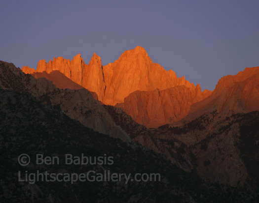 Whitney Sunrise. Lone Pine, California. The warm glow of morning light strikes Mt. Whitney (14,495 ft), the highest point in the USA outside of Alaska.  Ben Babusis, Lightscape Gallery.