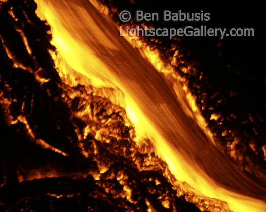 Lava Flow. Volcano National Park, Hawaii. Flowing lava from the mouth of Kilauea on Hawaii's Big Island.  Ben Babusis, Lightscape Gallery.