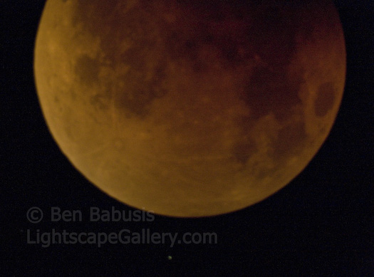 Lunar Eclipse. Seattle, Washington. Detail of a lunar eclipse through an 11