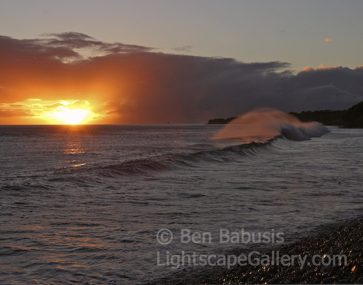 Sunset Wave. Maui, Hawaii. Offshore breeze blows spray from a breaking wave as it lights up from the setting sun.  Ben Babusis, Lightscape Gallery.