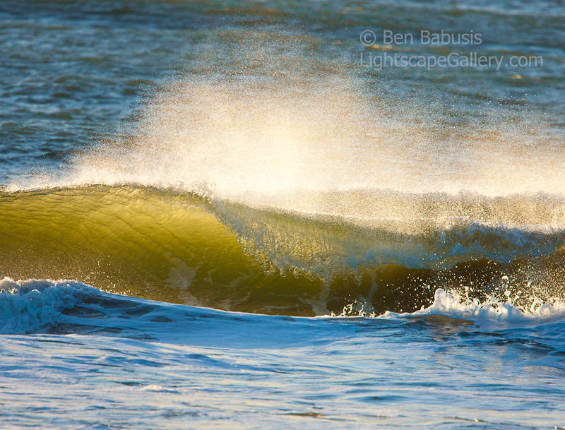 Curl. Ocean Shores, WA. Curling waves backlit by the setting sun.  Ben Babusis, Lightscape Gallery.