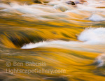 Liquid Gold. Grand Canyon, Arizona. The magic light of sunset reflects from the Colorado River in the heart of the Grand Canyon creating an iridescent golden glow.  Ben Babusis, Lightscape Gallery.