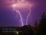 Twin Bolts. Issaquah, Washington. Two simultaneous bolts rain down over Issaquah, just east of Seattle, in a rare summer thunderstrom.  Ben Babusis, Lightscape Gallery.