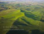 Green Square. The Palouse, Washington. Aerial view of spectacular farmland in southeastern Washington known as the Paulouse.  Farmers cultivate the fertile soil in fascinating patterns and right up and over the rolling hills. (Thanks to pilot Drew Coyle for aerial support.)  Ben Babusis, Lightscape Gallery.