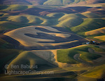 Above the Palouse. The Palouse, Washington. Aerial view of the convulted farmlands of the Palouse in southeastern Washington. (Thanks to pilot Drew Coyle for aerial support.)  Ben Babusis, Lightscape Gallery.