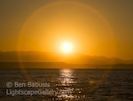 Sunset on Puget Sound. Seattle, Washington. Sailors enjoy the setting summer sun in Seattle. � Ben Babusis, Lightscape Gallery.