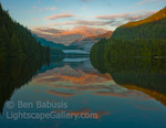 Sailboat Sunset. River's Inlet, British Columbia. The setting sun illuminates distant clouds over a remote inlet in western B.C.   Ben Babusis, Lightscape Gallery.