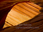 Wave Reflections. North Coyote Buttes, Arizona. Brilliantly colorful layering sandstone reflects in a puddle.  Ben Babusis, Lightscape Gallery.