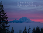 Rising from the Clouds. Issaquah, Washington. Mt. Rainier rises majestically above a cloud layer as the sky lights up just before sunrise.  Ben Babusis, Lightscape Gallery.