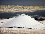 Snow Cone. Mauna Kea, Hawaii. A cinder cone near the summit of Mauna Kea is covered by snow after a winter storm on Hawaii's tallest peak.  Ben Babusis, Lightscape Gallery.