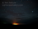 Lava Glow. Volcano National Park, Hawaii. A yellow glow in the night sky over Hawaii's Big Island from lava flowing from Kilauea.  Ben Babusis, Lightscape Gallery.
