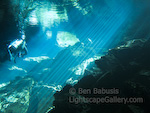 Beneath the Surface. Mayan Riviera, Mexico. Lightbeams penetrate deeply through the crystal clear water of this cenote in Mexico. � Ben Babusis, Lightscape Gallery.