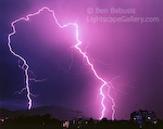Lightning Arch. Salt Lake City, Utah. A rare ground to ground lightning strike arches far into the sky over Salt Lake City during a powerful summer thunderstorm.  Ben Babusis, Lightscape Gallery.