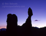 Balanced Rock. Arches National Park, Utah. Silhouette of a precariously balanced rock sandstone formation before sunrise.  Ben Babusis, Lightscape Gallery.