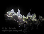 Cave Silhouette. Caves Branch, Belize. The silhouette of large stalactites hanging from the opening of a cave in central Belize.  Ben Babusis, Lightscape Gallery.