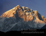 Nuptse. Sagarmatha National Park, Nepal. The last rays of sunlight strike Nuptse (25,790 ft) in Nepal.  Ben Babusis, Lightscape Gallery.