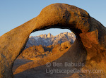 Mobius Arch. Alabama Hills, California. A rock arch in the Alabama Hills catches the first rays of sun. The arch frames Mt. Whitney, the highest peak in the continguous 48 states at 14,495 feet.  Ben Babusis, Lightscape Gallery.