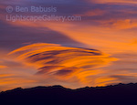Striated Sunset. Death Valley, California. A beautifully wind sculpted striated cloud is illuminated by sunrise over Death Valley.  Ben Babusis, Lightscape Gallery.