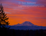 Rainier Sunrise. Issaquah, Washington. The sky erupts in a red glow behind Mt. Rainier on a beautiful fall morning in Issaquah  Ben Babusis, Lightscape Gallery.