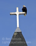 The High Perch. Ketchikan, Alaska. A bald eagle perches atop a church steeple on a Sunday morning.  Ben Babusis, Lightscape Gallery.