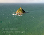 Lone Island. New Plymouth, New Zealand. A lone conical island rises from the sea off of New Plymouth on the North Island of New Zealand. � Ben Babusis, Lightscape Gallery.