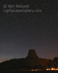 The Devil at Night. Devils Tower, Wyoming. Devils Tower rises in front of a sky filled with stars.  Ben Babusis, Lightscape Gallery.