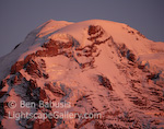 Rainier Sunset. Mt. Rainier, Washington. Sunset's red glow illuminates Mt. Rainier. � Ben Babusis, Lightscape Gallery.