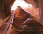Illumination. Antelope Canyon, Arizona. Lightbeam illuminates the colorful sandstone walls of this southwest slot canyon.  Ben Babusis, Lightscape Gallery.