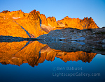 Tranquil Lake. The Enchantments, Washington. The warm light of early morning strikes the jagged peaks surrounding the aptly named Tranquil Lake in the Enchantments.  Ben Babusis, Lightscape Gallery.