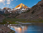 Red Slate Mountain. Lake Mildred, CA. First rays of sun strike 13,140' Red Slate Mountain in the high Sierra.  Ben Babusis, Lightscape Gallery.